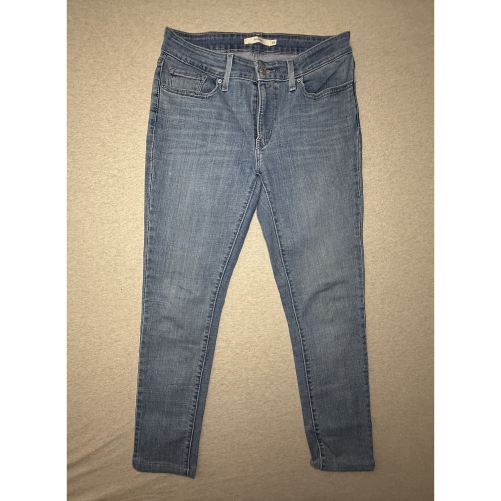 Levi's 711 Skinny fit jeans. size 28 waist. length adjusted med wash blue jeans